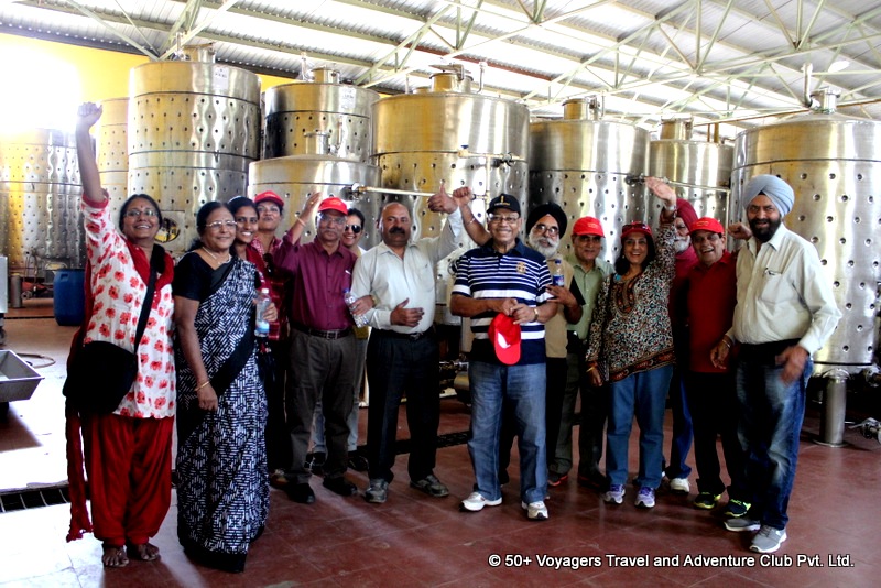 senior citizens enjoying vineyard tour